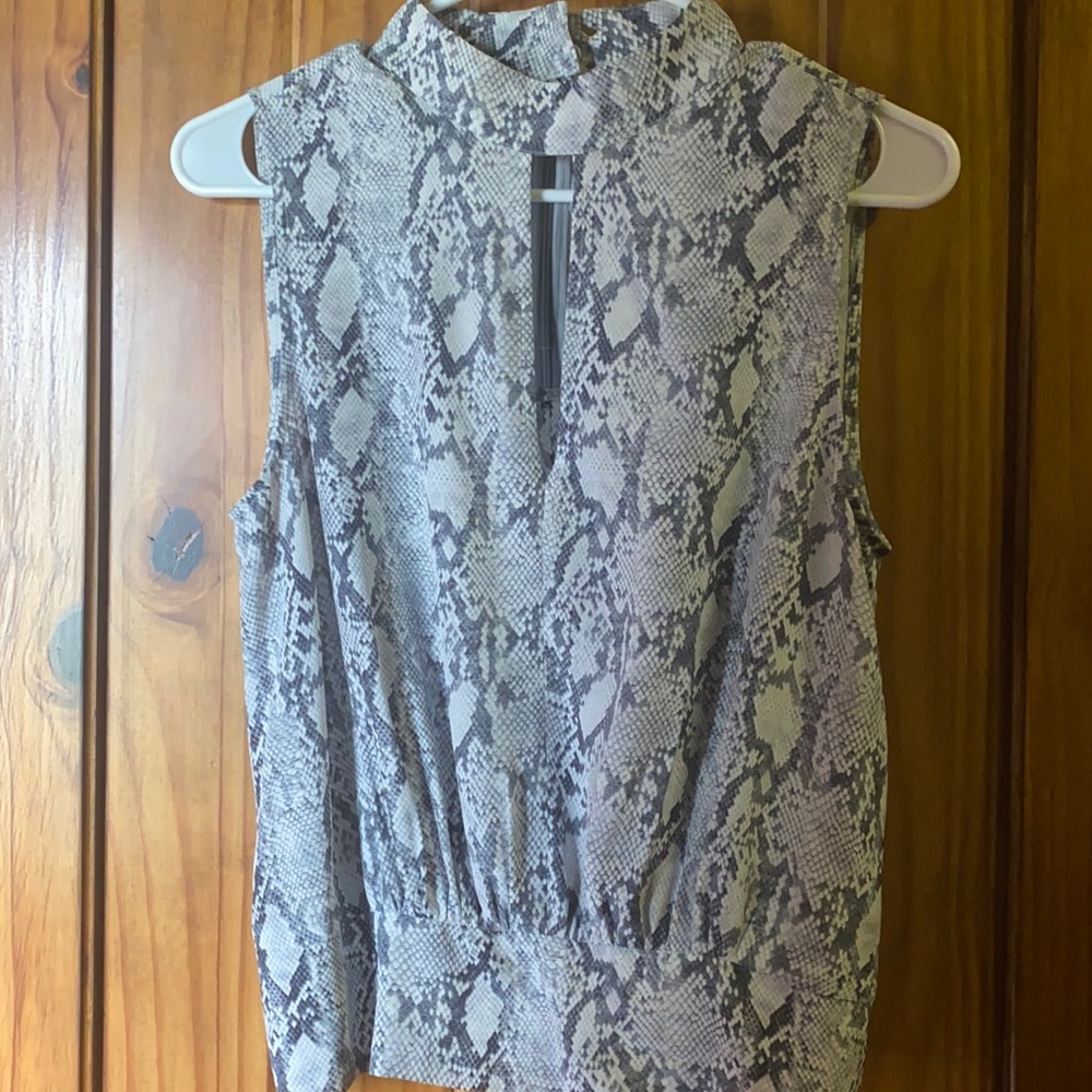 Frame Stylish Python Silk Sleeveless top with keyhole front. Chic and Lux style.